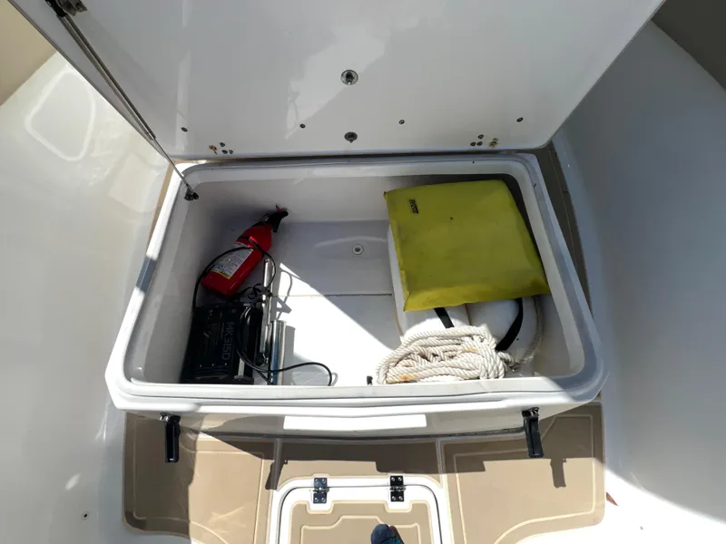 Slide: The Image of Storage compartment of 2016 Sea Fox 266 Commander with safety equipment and rope. - 35