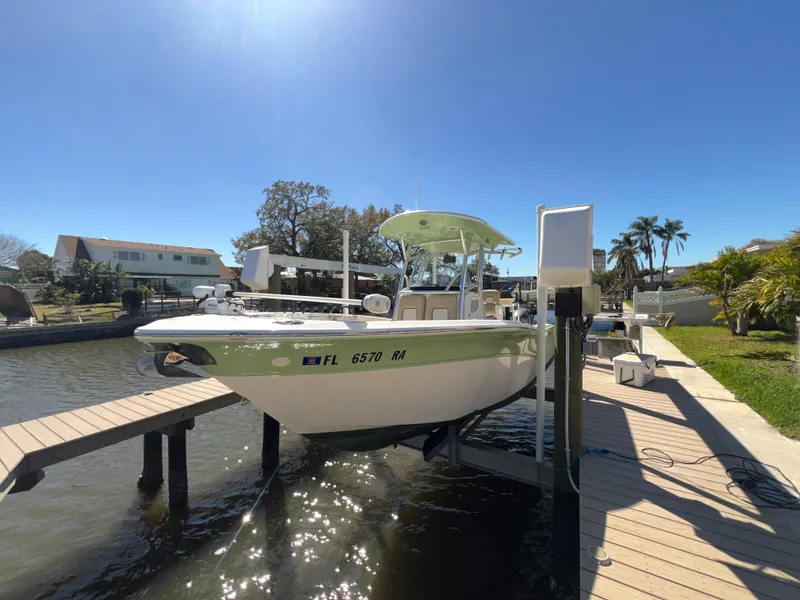 Slide: The Image of 2016 Sea Fox 266 Commander boat docked on a sunny day. - 39