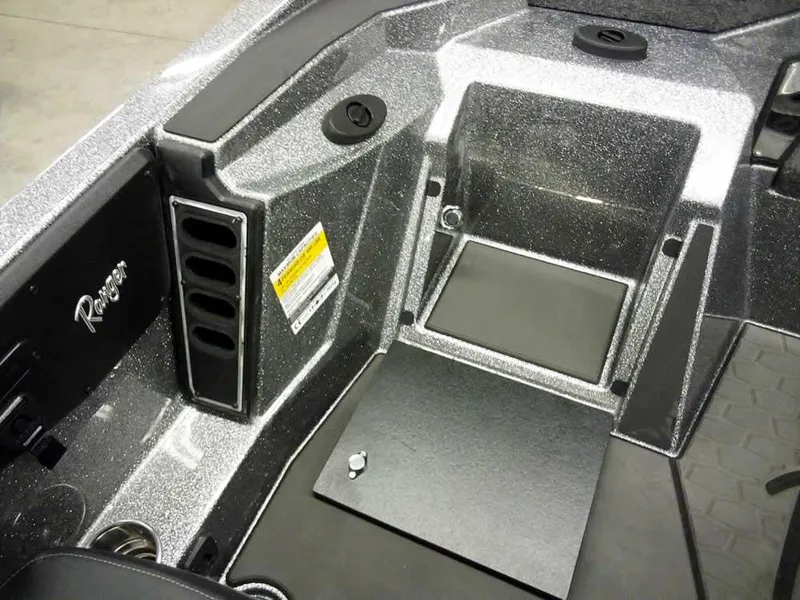Slide: The Image of 2025 Ranger Z519R Cup-Equipped boat interior with sleek storage compartments and metallic finish. - 24