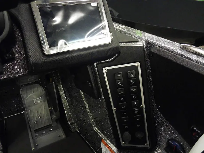 Slide: The Image of Control panel of 2025 Ranger Z519R Cup-Equipped boat with touchscreen and buttons. - 28