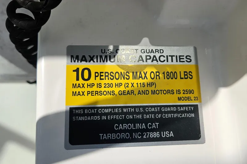 Slide: The Image of 2014 Carolina Cat 230 DC capacity label: 10 persons or 1800 lbs, max 230 HP. - 20