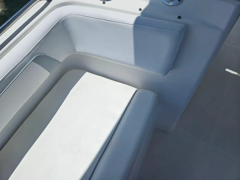 Slide: The Image of White seating area on a 2014 Carolina Cat 230 DC boat. - 8