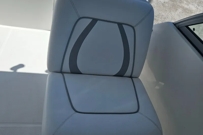 Slide: The Image of 2014 Carolina Cat 230 DC boat seat with gray accents. - 9
