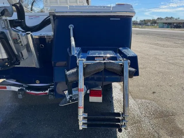 Slide: The Image of 2025 Robalo 266 Cayman boat with a rear view of the ladder and motor mount. - 4