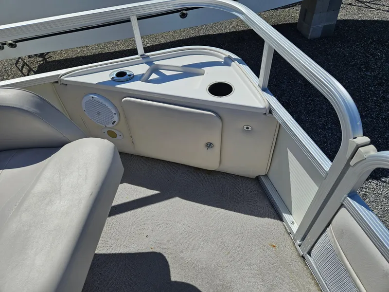 Slide: The Image of 2007 Bennington 2577RFS boat interior with seating and speaker detail. - 7