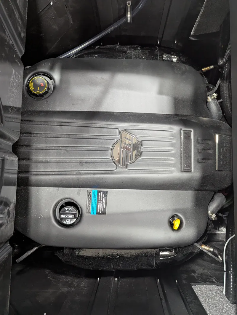 Slide: The Image of 2025 Malibu Wakesetter 23 LSV engine compartment, showcasing sleek design and advanced engineering. - 5