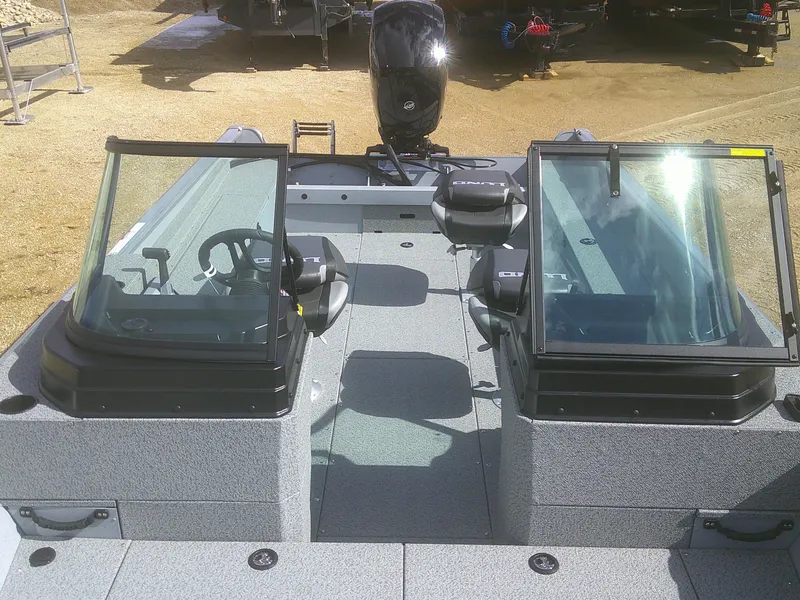 Slide: The Image of 2025 Lund 2075 Alaskan Sport boat interior with dual windshields and seating. - 8