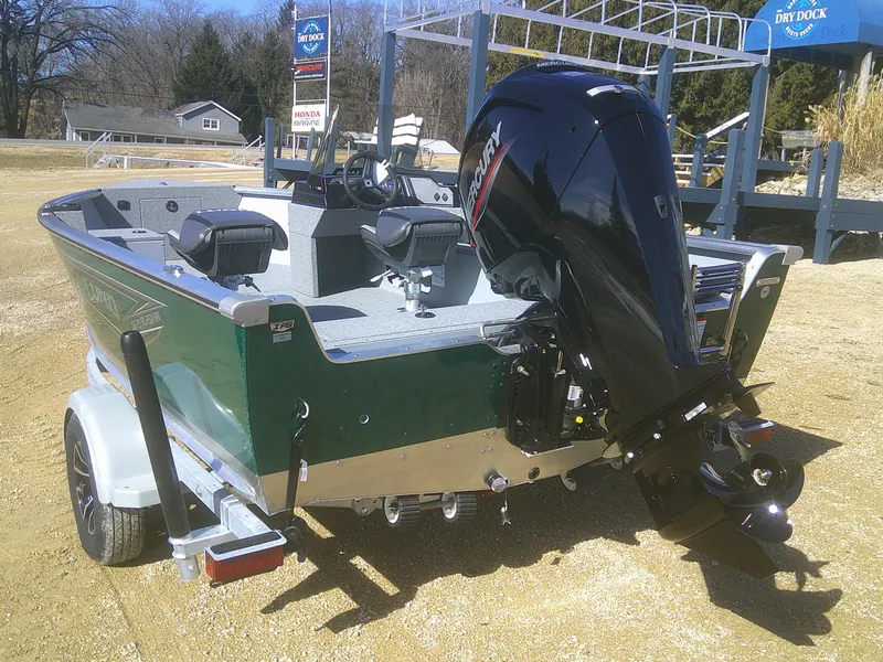 Slide: The Image of 2025 Lund 1675 Alaskan SS boat with outboard motor on a trailer. - 17