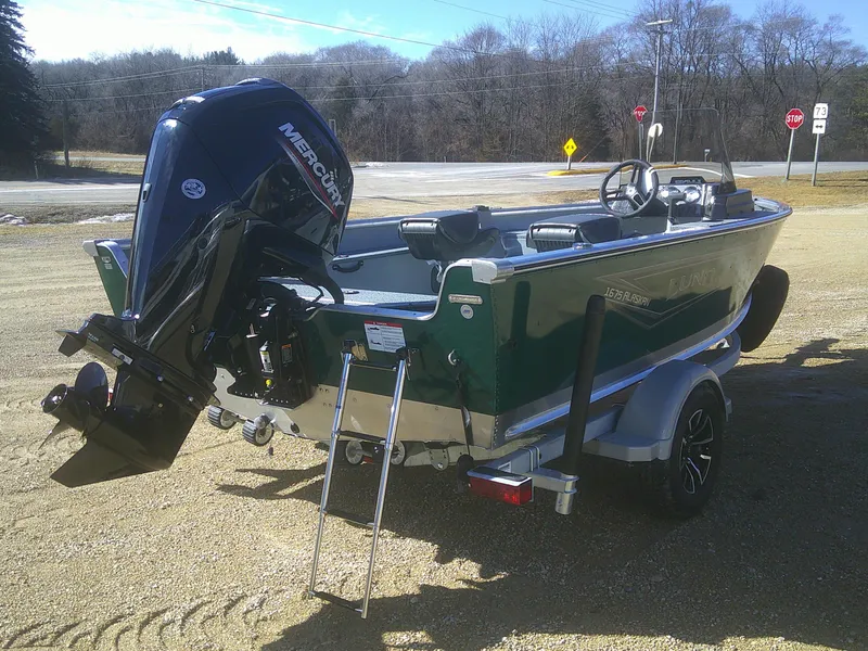 Slide: The Image of 2025 Lund 1675 Alaskan SS boat on trailer with Mercury outboard motor. - 3