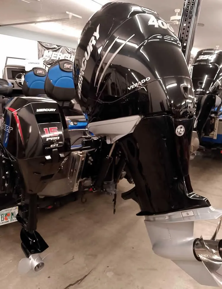 Slide: The Image of 2021 Ranger 622FS Pro boat with Mercury 400 Verado outboard motor in a garage. - 14