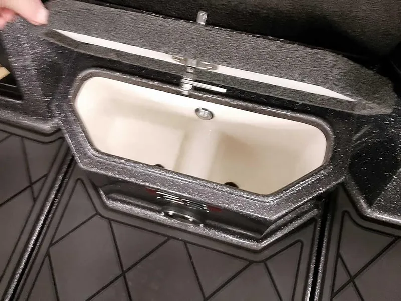 Slide: The Image of 2021 Ranger 622FS Pro boat storage compartment with open lid. - 19