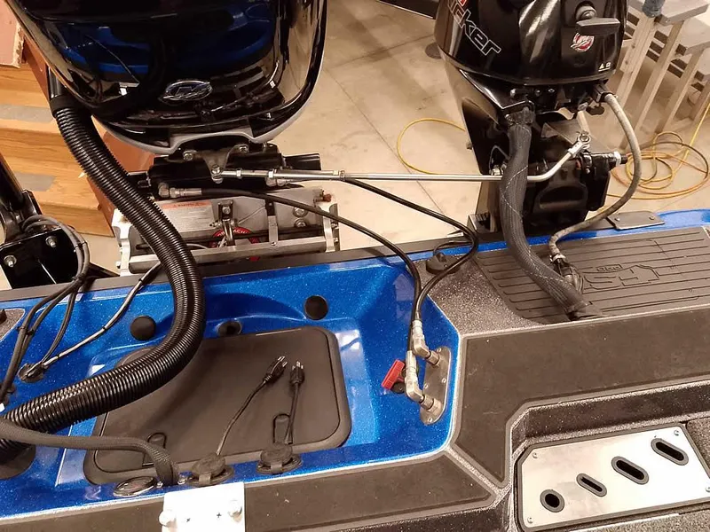 Slide: The Image of 2021 Ranger 622FS Pro boat engine setup with cables and wiring. - 48