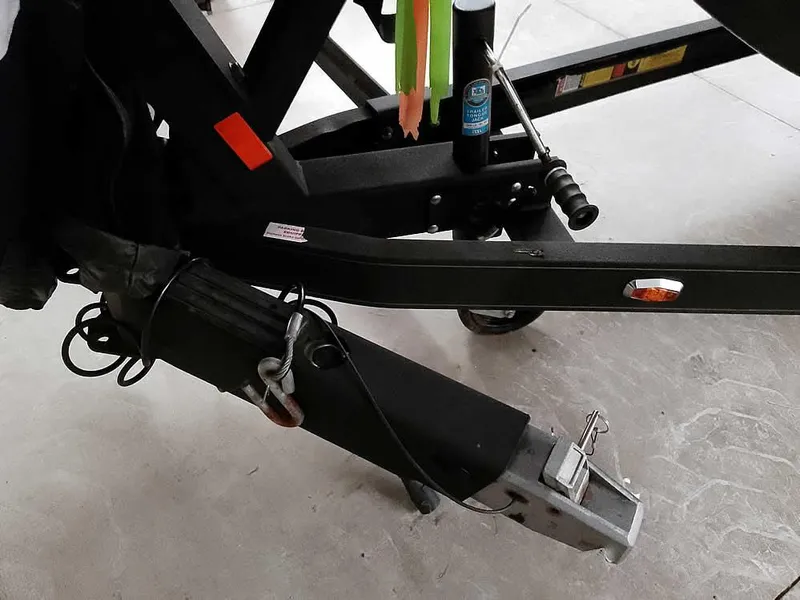 Slide: The Image of Trailer hitch of 2021 Ranger 622FS Pro boat, featuring secure locking mechanism. - 7