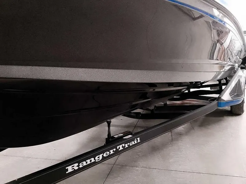 Slide: The Image of 2021 Ranger 622FS Pro boat on Ranger Trail trailer, side view. - 8