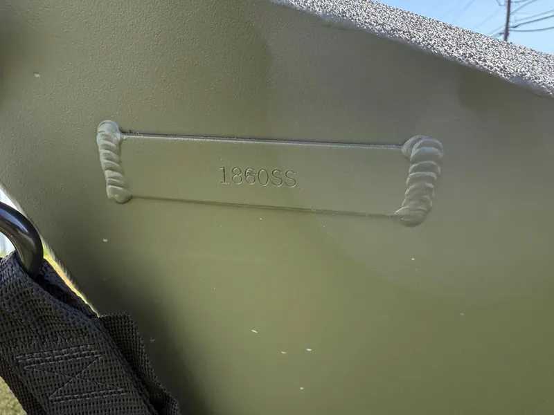 Slide: The Image of Close-up of 2025 Alweld 1860 SC FLAT boat model number engraving. - 7