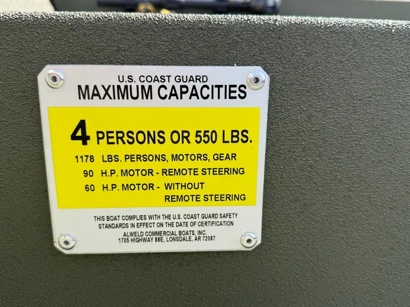 Slide: The Image of 2025 Alweld 1860 SC FLAT capacity plate, 4 persons or 550 lbs, U.S. Coast Guard compliant. - 8