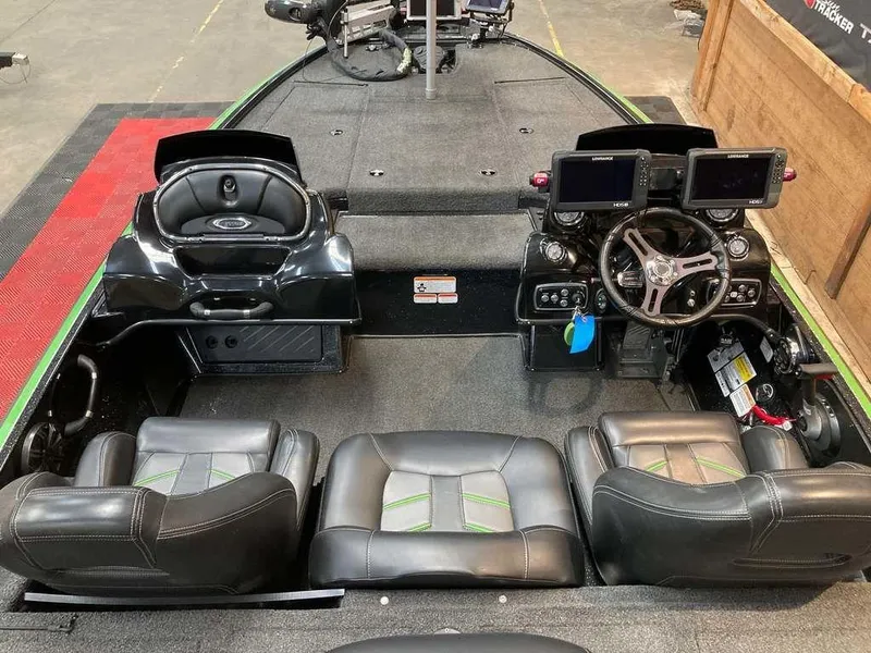 Slide: The Image of 2017 Nitro Z19 boat interior with dual consoles, leather seats, and advanced navigation systems. - 6