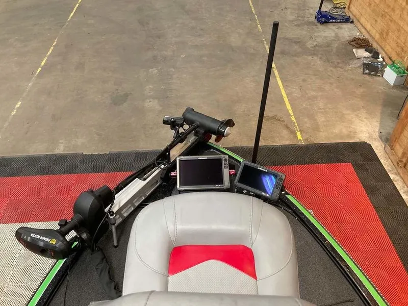 Slide: The Image of 2017 Nitro Z19 boat cockpit with navigation screens and trolling motor. - 9