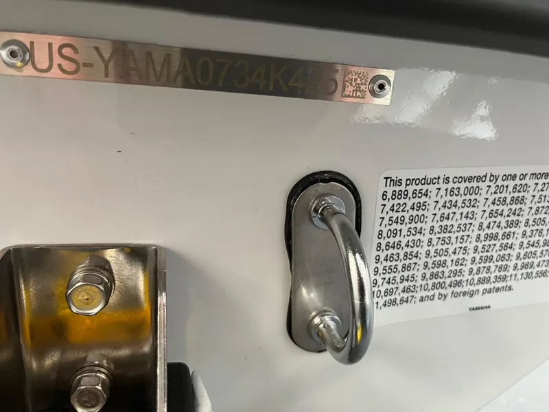 Slide: The Image of 2025 Yamaha WaveRunner JetBlaster LTD hull identification and patent information plate. - 11