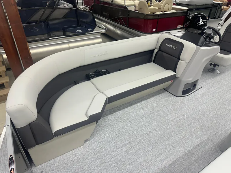 Slide: The Image of 2025 Harris Cruiser 230 boat interior with sleek seating and modern design. - 4