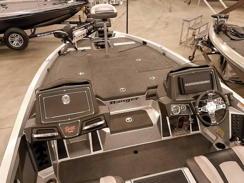 Slide: The Image of 2019 Ranger Z519 DC fishing boat interior with dual consoles and advanced electronics. - 15