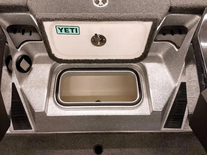 Slide: The Image of 2019 Ranger Z519 DC boat storage compartment with Yeti cooler. - 16