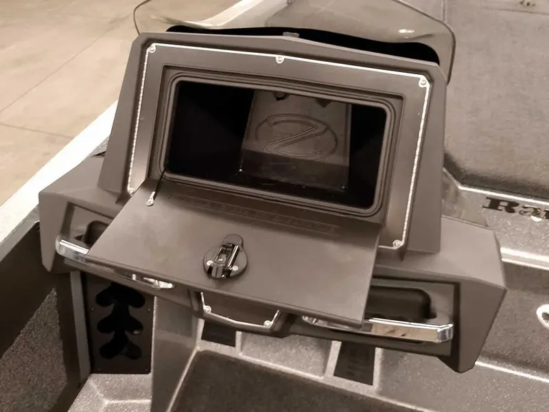 Slide: The Image of 2019 Ranger Z519 DC boat dashboard compartment with open storage. - 28