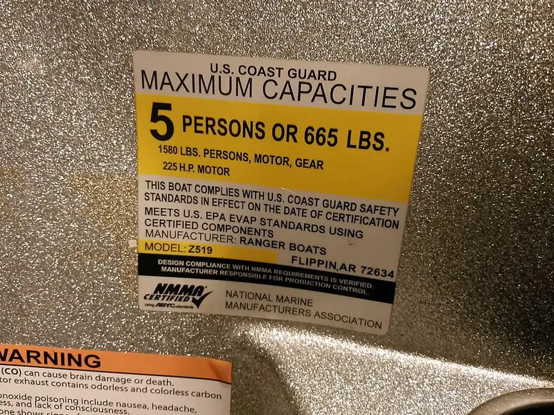 Slide: The Image of 2019 Ranger Z519 DC capacity label: 5 persons or 665 lbs, 225 HP motor. - 29