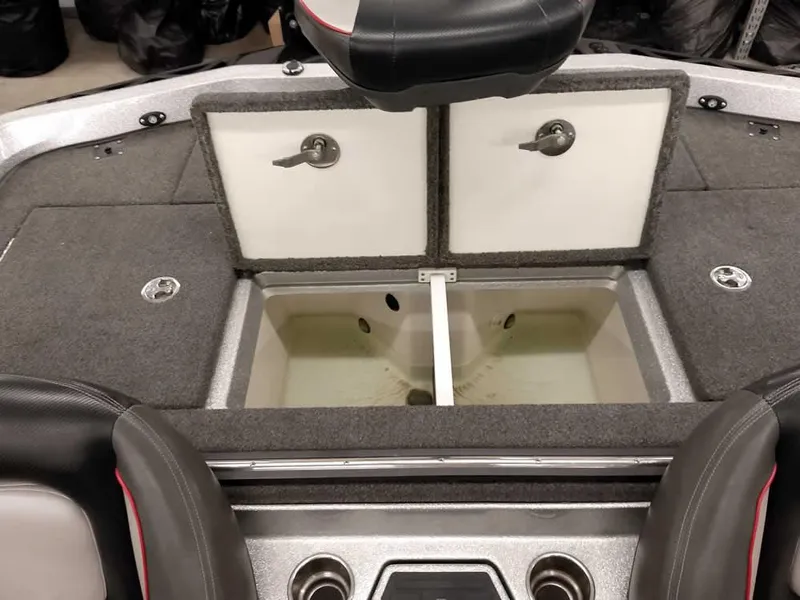 Slide: The Image of 2019 Ranger Z519 DC boat interior with storage compartments and seating. - 34