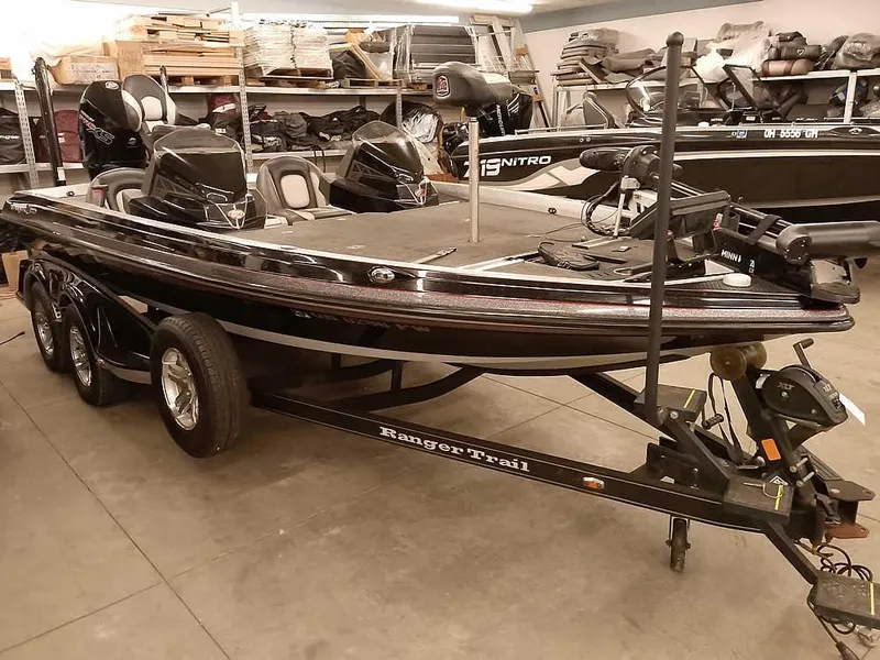 Slide: The Image of 2019 Ranger Z519 DC bass boat on trailer in a storage facility. - 41