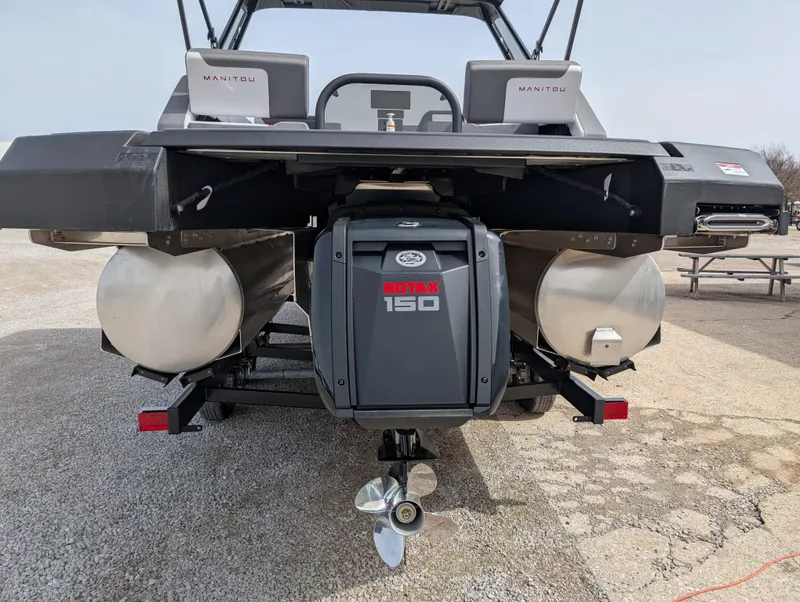 Slide: The Image of 2025 Manitou Cruise boat with Rotax 150 engine, rear view. - 26