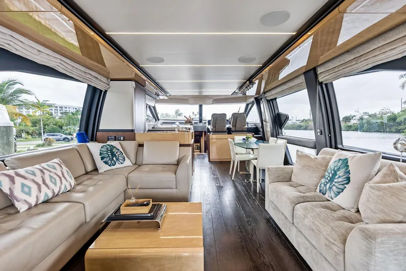 Slide: The Image of Luxurious interior of 2017 Azimut 72 Flybridge yacht with elegant seating and panoramic windows. - 27