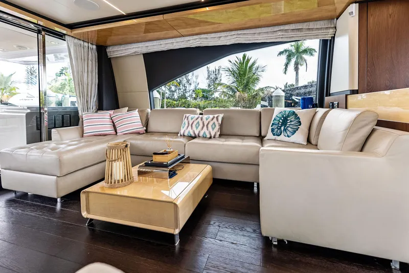 Slide: The Image of Luxurious interior of 2017 Azimut 72 Flybridge yacht with elegant beige seating and decorative pillows. - 28