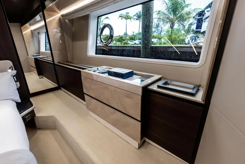 Slide: The Image of Luxurious interior of 2017 Azimut 72 Flybridge yacht with elegant furnishings and large window. - 43