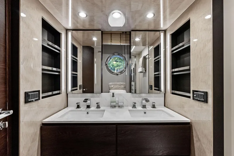 Slide: The Image of Luxurious bathroom in 2017 Azimut 72 Flybridge yacht with dual sinks and modern design. - 47