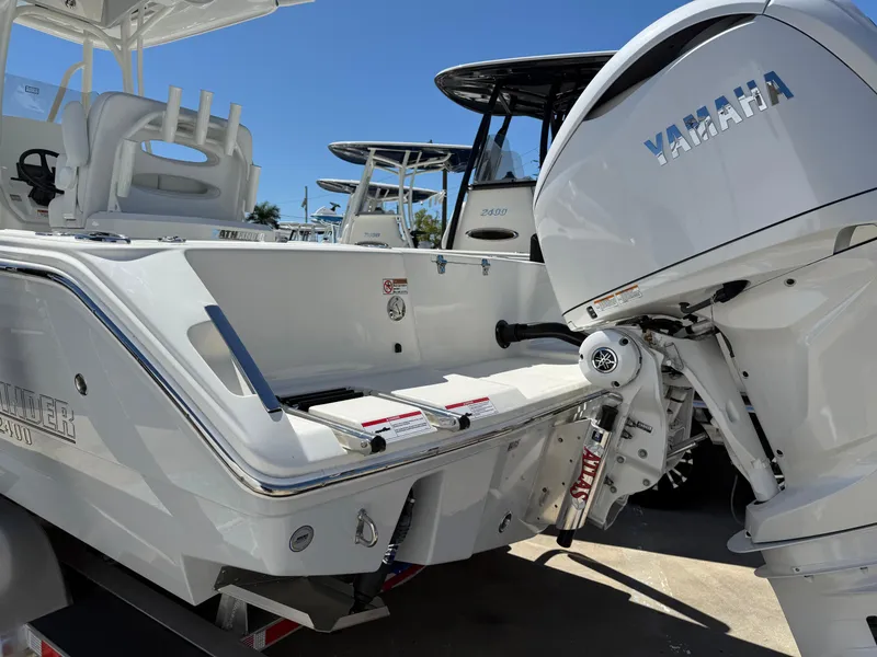 Slide: The Image of 2025 Pathfinder 2400 Open boat with Yamaha engine, rear view. - 2