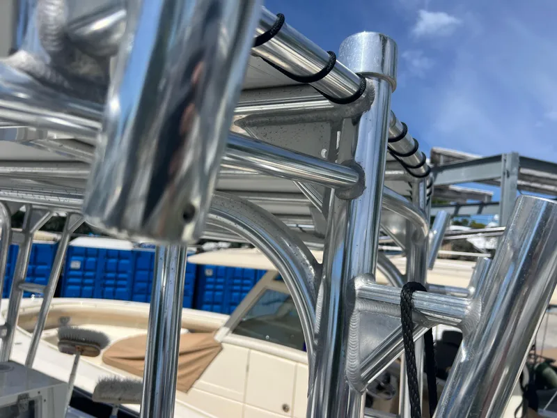 Slide: The Image of Close-up of a 1999 Contender 35 Center Console boat's metal framework. - 26