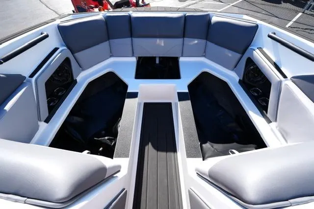 Slide: The Image of 2025 Moomba Max boat interior with spacious seating and modern design. - 18