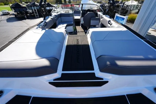 Slide: The Image of 2025 Moomba Max boat interior with spacious seating and modern design. - 24