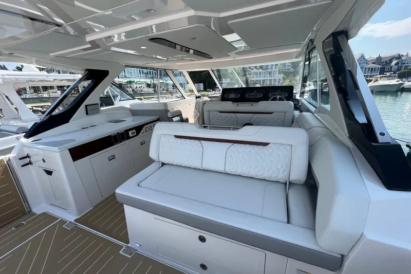 Slide: The Image of Luxurious interior of 2026 Regal LX43 yacht with elegant seating and modern design. - 12