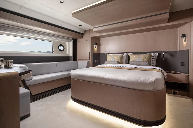 Slide: The Image of Luxurious interior of 2025 Sirena 48 yacht with elegant bedroom and seating area. - 13