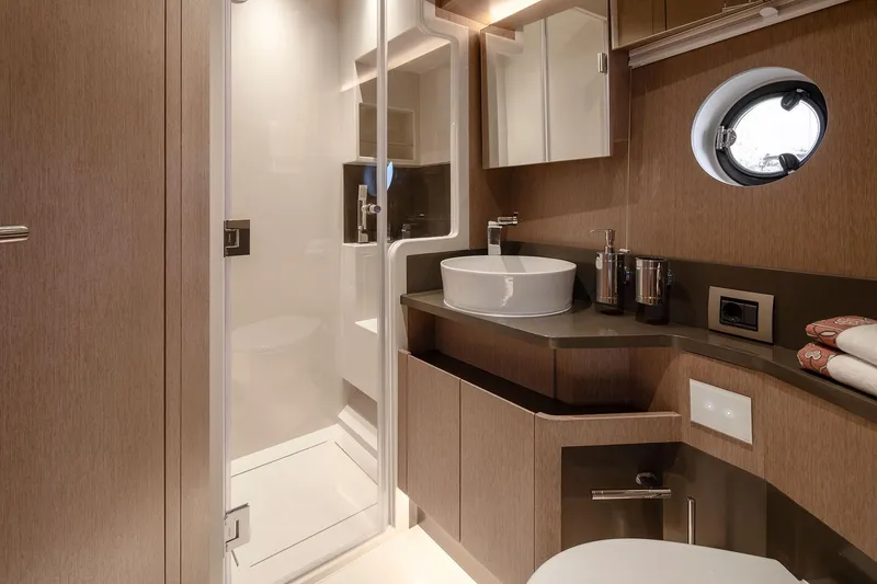 Slide: The Image of Modern bathroom in 2025 Sirena 48 yacht with sleek design and elegant fixtures. - 17