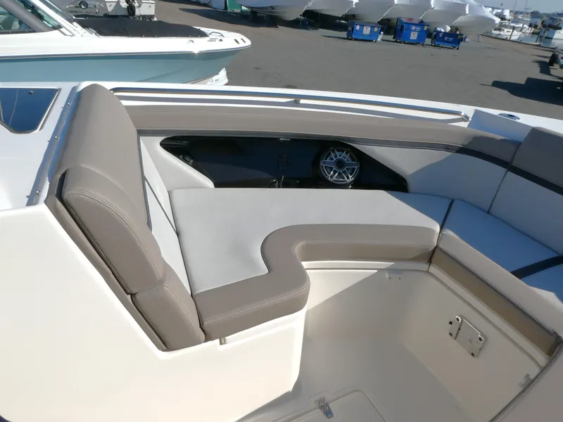 Slide: The Image of 2025 Boston Whaler 330 Vantage boat interior with cushioned seating. - 13