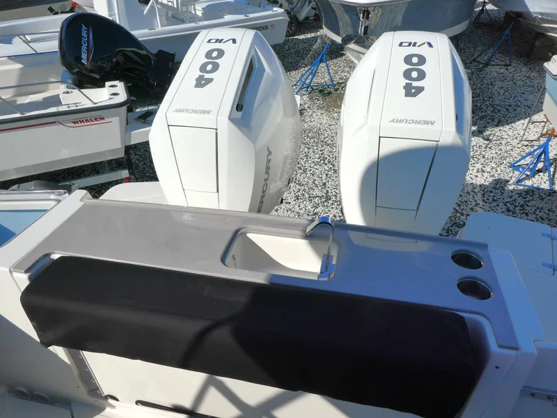 Slide: The Image of Boston Whaler 330 Vantage 2025 with twin 400 V10 Mercury engines, rear view. - 16