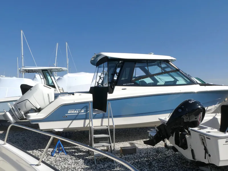 Slide: The Image of 2025 Boston Whaler 330 Vantage boat on display, featuring sleek design and modern amenities. - 3