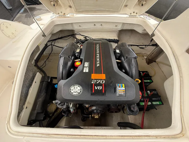 Slide: The Image of 2015 Chaparral Sunesta 224 boat engine compartment with Volvo Penta 270 V8 engine. - 23