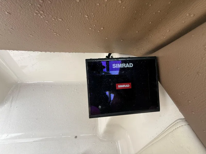 Slide: The Image of Simrad display on 2015 Chaparral Sunesta 224 boat interior. - 41