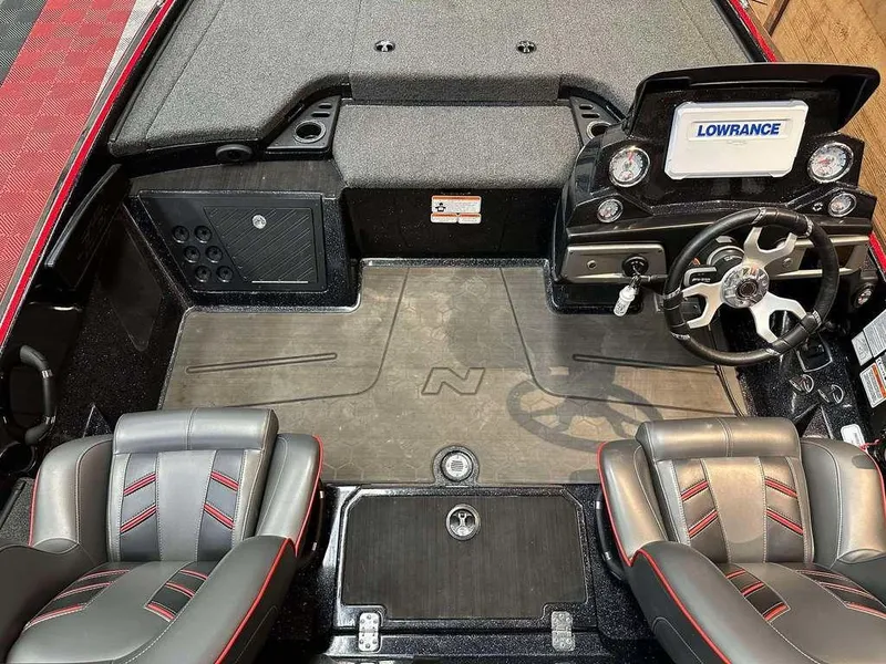 Slide: The Image of 2023 Nitro Z19 Pro boat interior with steering wheel and Lowrance display. - 6