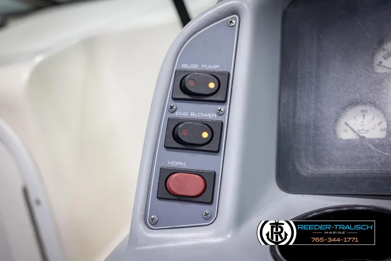 Slide: The Image of Control panel of 1996 Thunderbird Falcon 2270 CD boat with switches and gauges. - 25