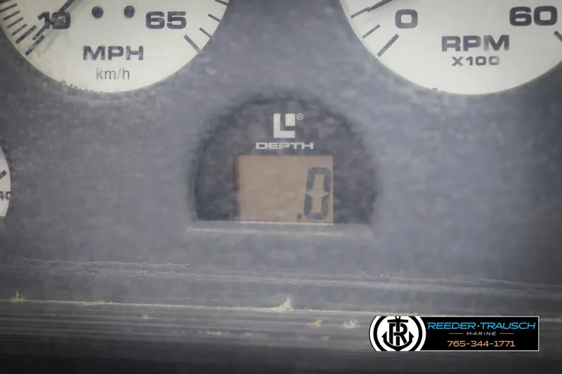 Slide: The Image of Dashboard of a 1996 Thunderbird Falcon 2270 CD with speedometer and RPM gauges. - 27